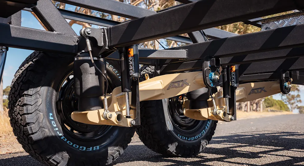 Caravan and trailer suspension system